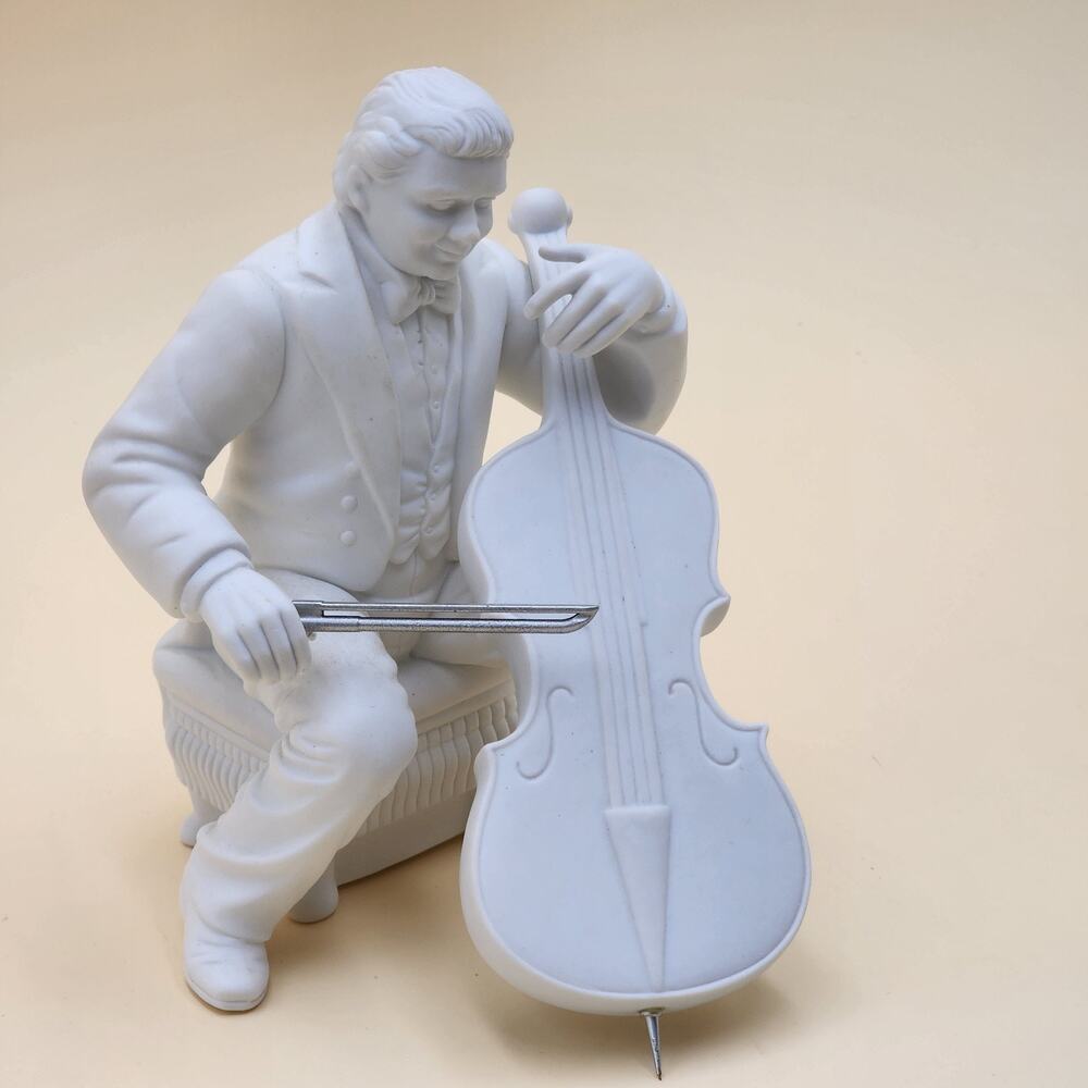 Department 56 Winter Silhouette Christmas Concerto Cellist Porcelain Figurine